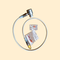 Medical device with tubing and connectors on a beige background